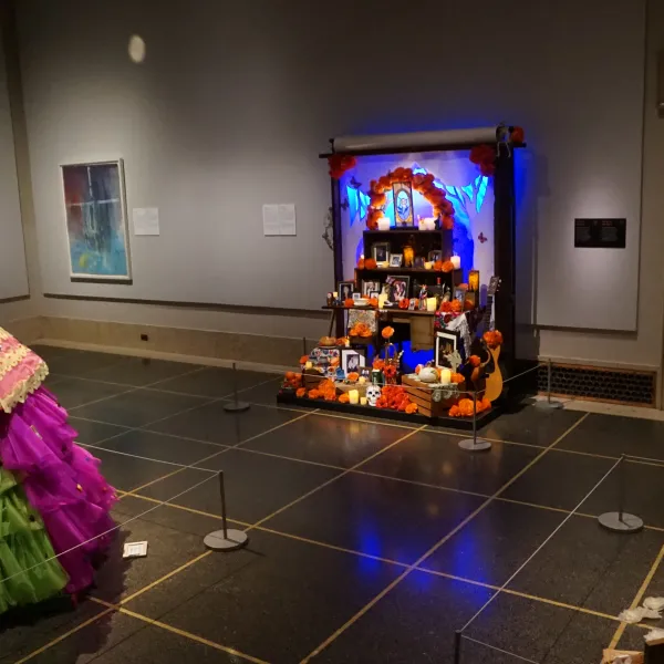 Ofrenda altars set up in the DIA galleries for the 2023 installation of Ofrendas: Celebrating el Dia de Muertos.